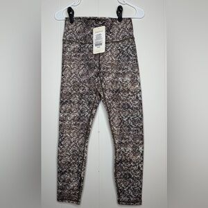 Fabletics Woman’s Snake Pattern Leggings - Brown and Black